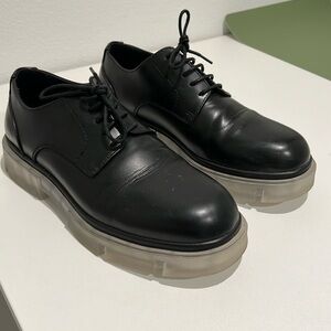Black shoes with clear rubber sole